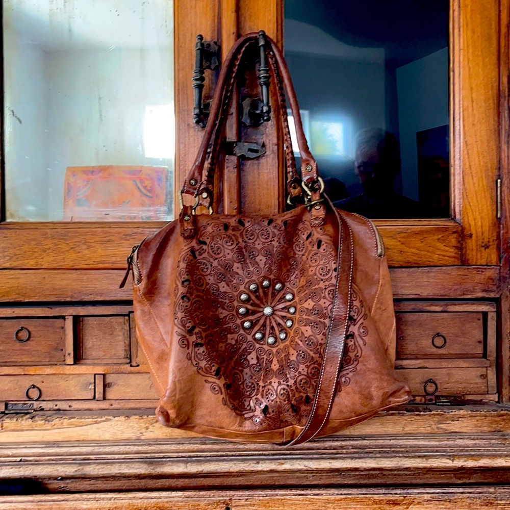 Beautiful, meant to look vintage boho handbag.